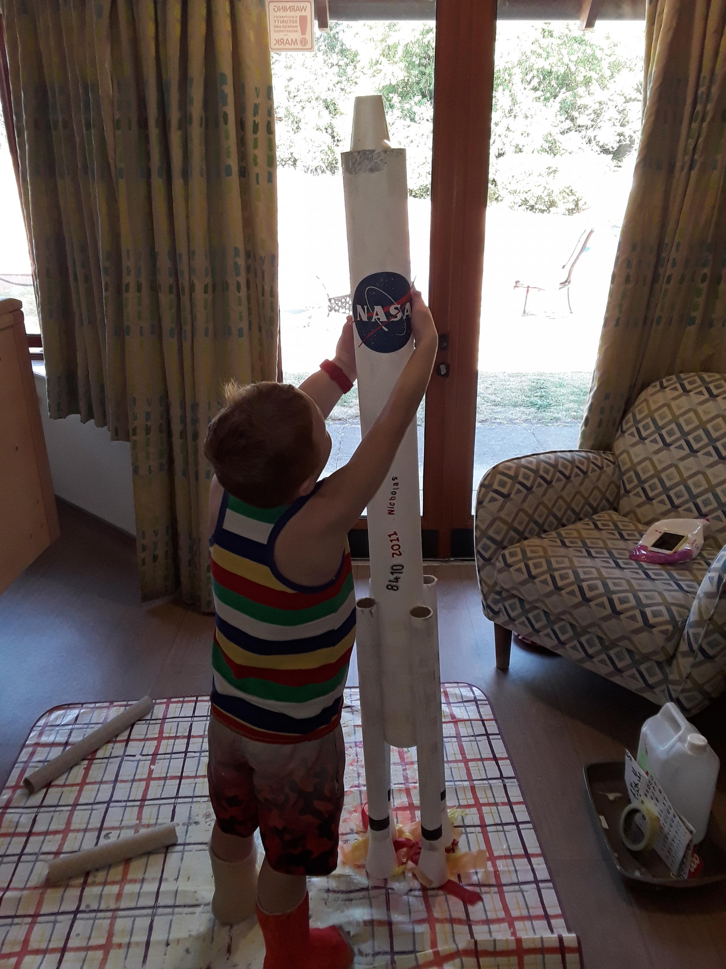 Nicholas building his rocket in the hospice