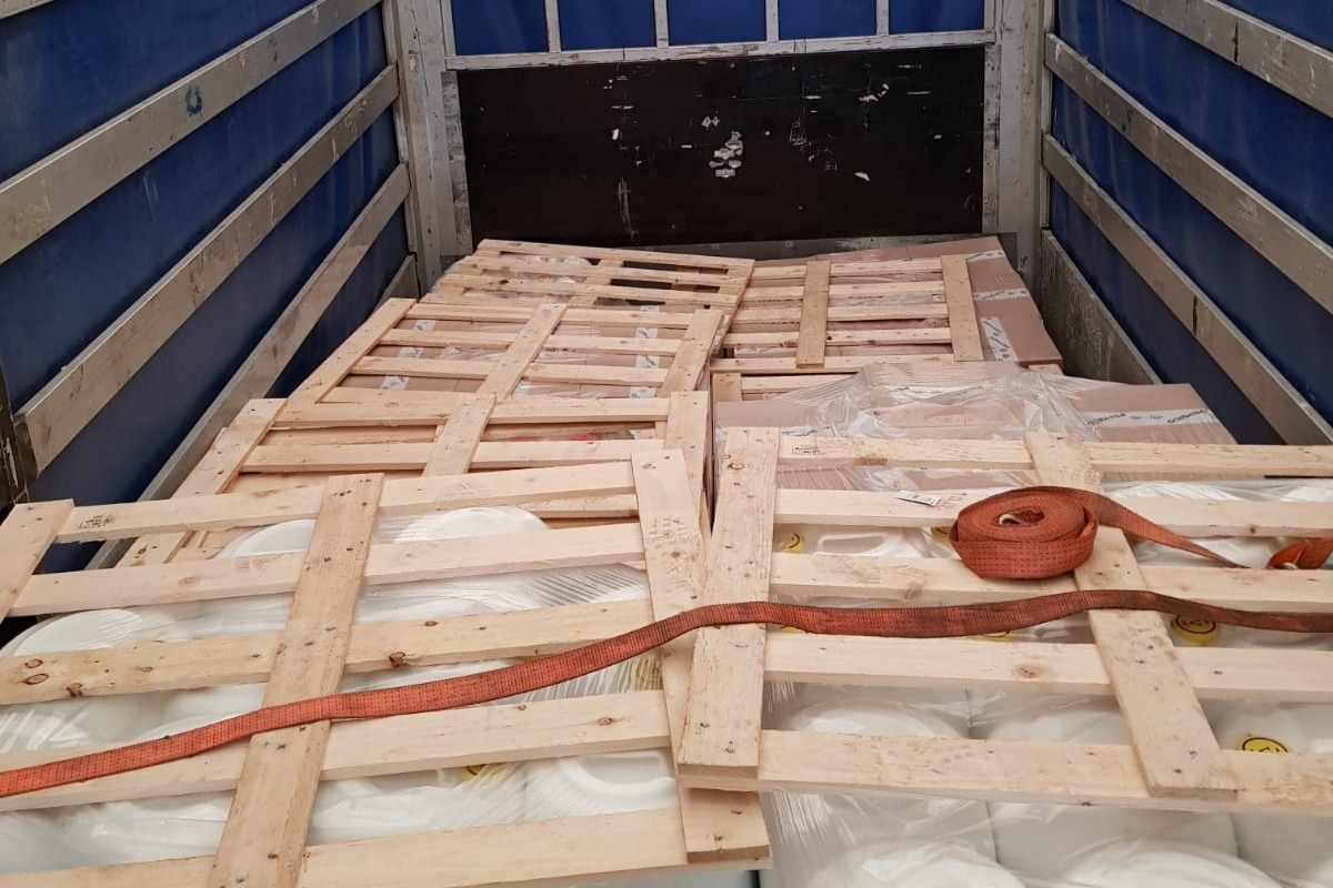 National Crime Agency said 16 migrants were found sitting on pallets that had been laid on top of the cargo. 