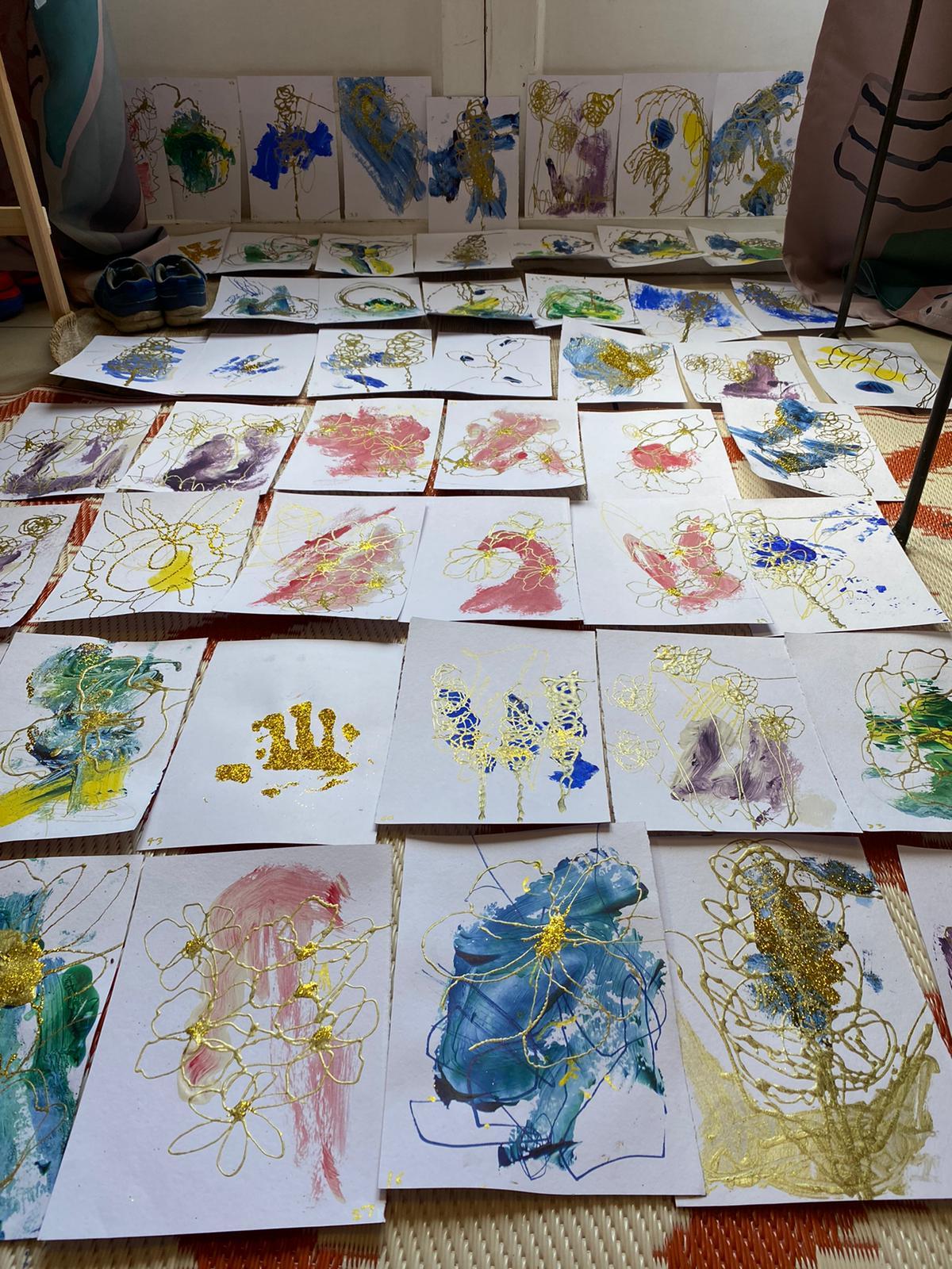 Lucy and Archie made 100 paintings in honour of Tom Moore