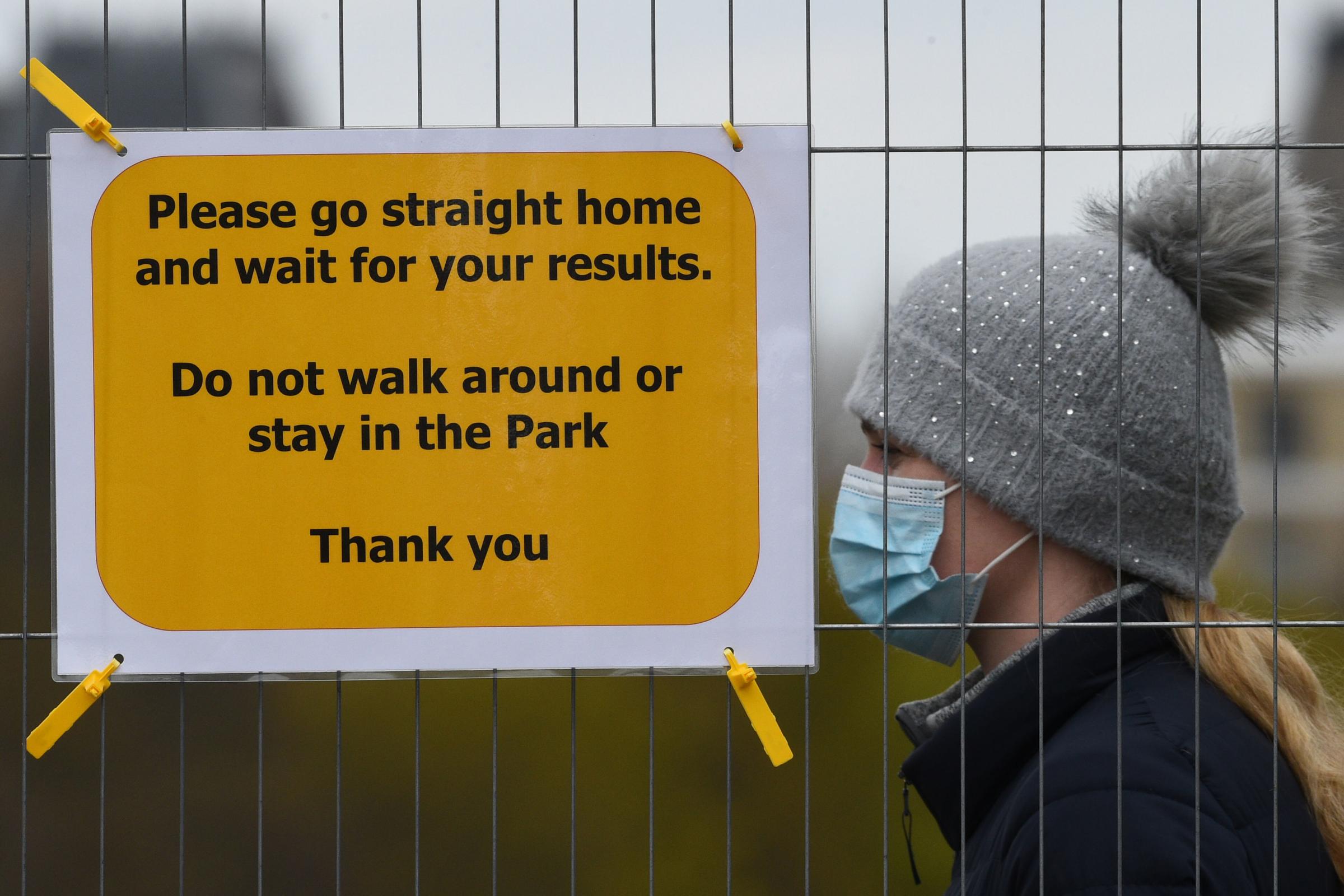 People take part in coronavirus surge testing on Clapham Common, south London. Kirsty OConnor/PA Wire 