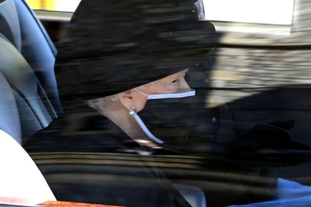 PA Wire - The Queen wipes a rear at the Duke of Edinburghs funeral