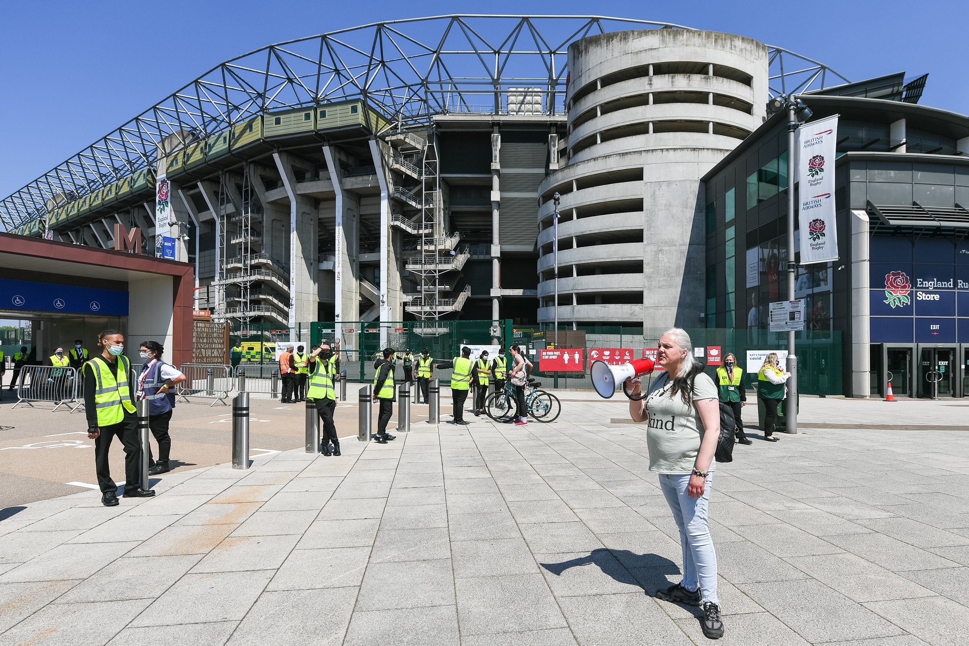 An anti-vaccination protester pictured outside the Twickenham Stadium event