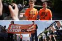 Download Just Stop Oil protesters take part in a slow walk protest near Wimbledon Magistrates' Court, London, as two of their activists, Samuel Johnson and Patrick Hart, are due to appear charged with aggravated trespass