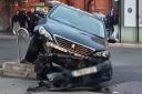 Shocking pictures show car battered with bottom hanging off after Wimbledon crash