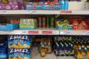 PRIME being stocked in between children's drinks in Sainsbury's in Sutton