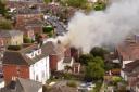 Drone footage shows a fire rip through a house in Shirley