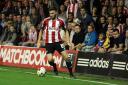 Brentford: Dallas snatches win for Bees
