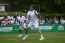 Legends: Former British number one Andrew Castle and Mansour Bahrami in action at Hurlingham last year