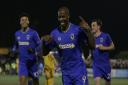 AFC Wimbledon's Tom Elliott celebrates after scoring against Sutton United - but the night was to end is disappointment for the Dons