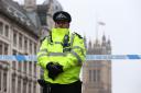 A police officer near Westminster where a terrorist carried out a savage attack on Wednesday, March 22