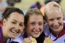Laura Trott (centre) is first woman cyclist to win two Gold medals at a single Games for Team GB