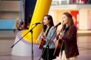 Ella Harding and Rosi Yip perform together