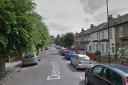 An 85-year-old woman fell to the floor when she was robbed of her handbag in Dennett Road