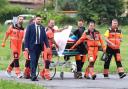 Rescue workers wheel Slovak Prime Minister Robert Fico, who was shot and injured, to a hospital (Jan Kroslak/AP)