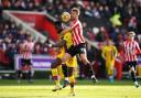 Crystal Palace's Odsonne Edouard (left) and Brentford's Kristoffer Ajer battle for the ball during the Premier League match at the Brentford Community Stadium, London.