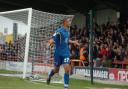 Signing off in style: Byron Harrison celebrates his goal against Shrewsbury