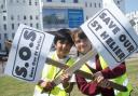 Ten year olds Sahil and Morgan with Save St Helier plaques