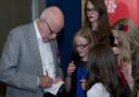 Richard Wilson, who played Victor Meldrew in One Foot in the Grave, signs autographs for fans at the Rose Theatre