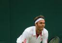 Determined: Ross Hutchins' return to action at Wimbledon was short-lived, but he remains confident his form will return