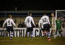 Unlikely hero: Casuals keeper Danny Bracken turns to celebrate scoring his decisive penalty on Tuesday night