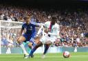 One of the three: Chelsea's Nemanja Matic shadows Crystal Palace winger Wilfried Zaha