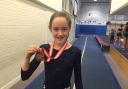 Bronzed: Richmond Gymnastics Association’s Georgie Forbes, 11, and her medal