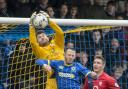 Banned: York City keeper Scott Flinders has been found guilty by the FA of racial abuse during the defeat to AFC Wimbledon last season