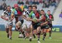 On the prowl: Sam Smith makes a break in Harlequins' 31-23 LV= Cup win over Bath in 2013