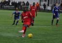 Omar Koroma tucks away his penalty for Carshalton Athletic. Picture: Ian Gerrard