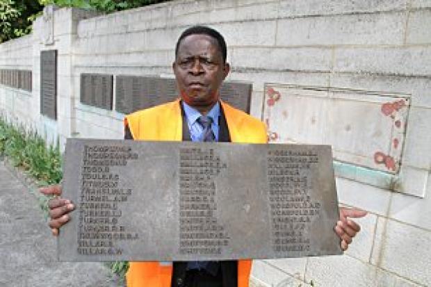 Vincent Eghwurudje with the plaque