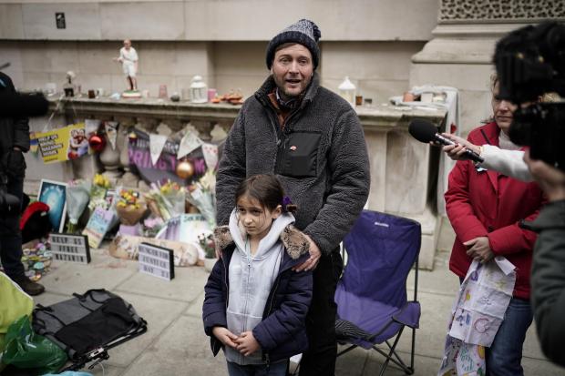 Your Local Guardian: Richard Ratcliffe, the husband of Iranian detainee Nazanin Zaghari-Ratcliffe, with his daughter Gabriella, he is ending his hunger strike in central London after almost three weeks. Credit: PA