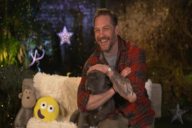 Tom Hardy, who will return to CBeebies Bedtime Stories over Christmas accompanied by his festive French Bulldog Blue. Credit: BBC/PA
