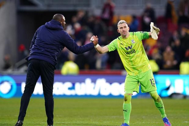 Crystal Palace manager Patrick Vieira (left) and goalkeeper Vicente Guaita shake hands after the Premier League match at the Brentford Community Stadium, London.