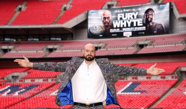 Your Local Guardian: Tyson Fury poses on the pitch after the press conference at Wembley Stadium, London (PA)