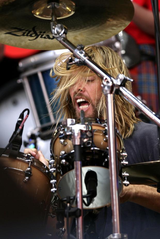 Your Local Guardian: Taylor Hawkins performs during the Live Earth charity concert at Wembley Stadium, London (PA)