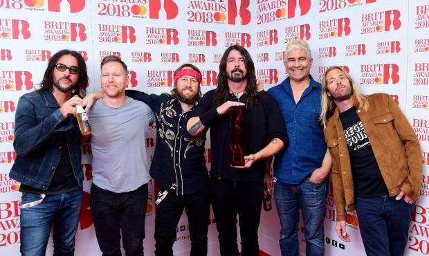 Your Local Guardian: Foo Fighters with their award for Best International Group during the 2018 Brit Awards (PA)