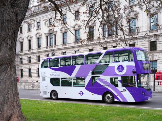 Your Local Guardian:  The iconic red has vanished from London buses as they get a purple makeover. (PA)