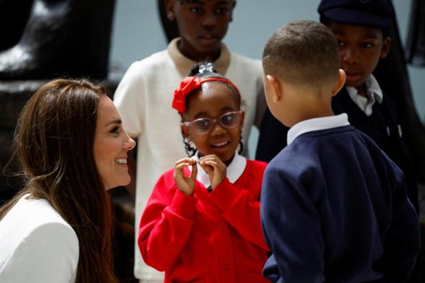 Your Local Guardian: The Duchess of Cambridge speaks with children at the unveiling of the National Windrush Monument the unveiling of the National Windrush Monument at Waterloo Station, to mark Windrush Day