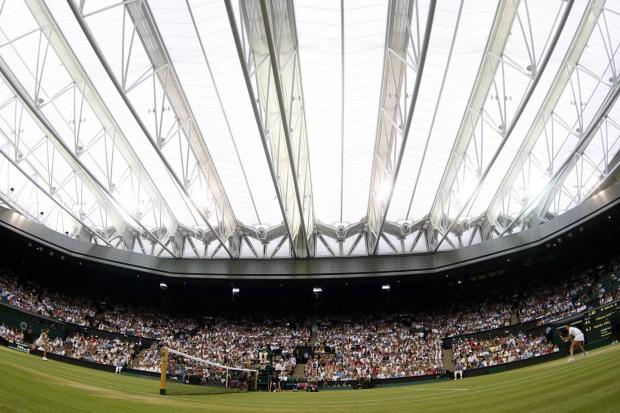 Wimbledon's new Centre Court roof was closed for the first time