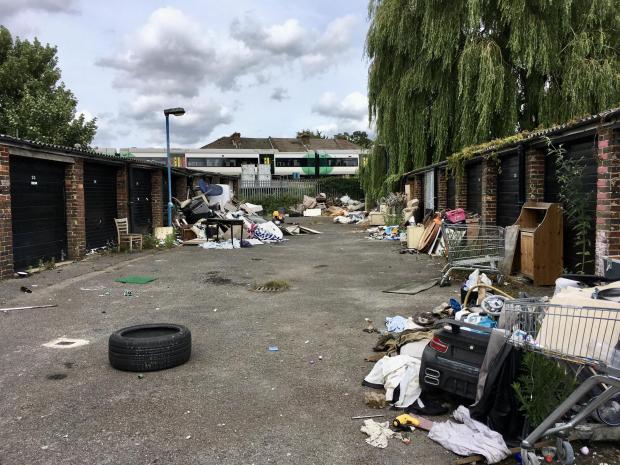 Your Local Guardian: The mounds of rubbish outside garages in Holmesdale Road (photo: Tara O'Connor)