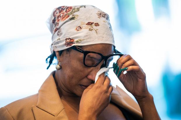 Your Local Guardian: Nicol Davies, the mother of missing student nurse Owami Davies, wipes away tears as she speaks to the media at New Scotland Yard, central London