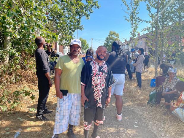 Your Local Guardian: Residents Delroy Simms, 62, (left) and Kutoya Kukanda, 50, said they helped rescued three children from the rubble at around 7am, but they feared a girl aged around four or five was still trapped inside (image: PA media)