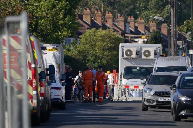 Gas engineers at the scene on Galpin's Road, Thornton Heath, south London, where four-year-old Sahara Salman died when a terraced home collapsed following an explosion and fire on Monday (image: PA)