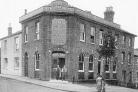 Then and now: This first image shows the pub almost a century ago.....