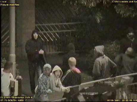 Police images of looting wanted in Mitcham and Colliers Wood.