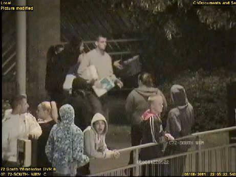 Police images of looting wanted in Mitcham and Colliers Wood.