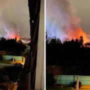 Smoke and flames could be seen billowing from the fire at Deroy Close, Carshalton. Images: Megan Kirby