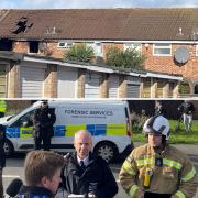 Emergency services at the scene following a house fire in Channel Close, Hounslow, in which five people have died and one person is unaccounted for