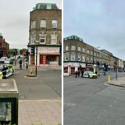 A busy road in Brixton has been closed off after gun shots were fired into a Sainsbury's store window.