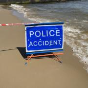A man has been arrested on suspicion of murder after a woman was fatally stabbed on a beach in Bournemouth.
